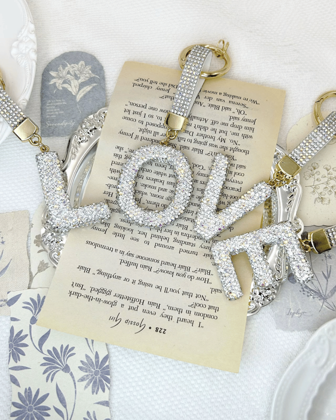 Rhinestone LOVE keychains with crystal wrist strap and gold hardware