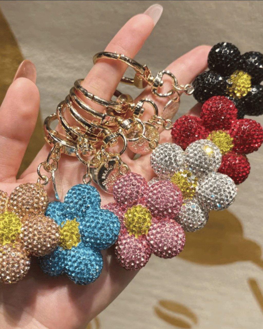 Rhinestone flower keychains with crystal ball charm in multiple colours