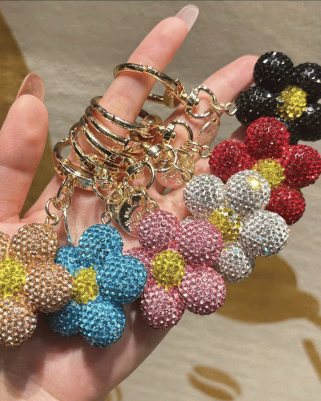 Rhinestone flower keychains with crystal ball charm in multiple colours